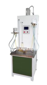 Vertical permeability tester for geotextiles